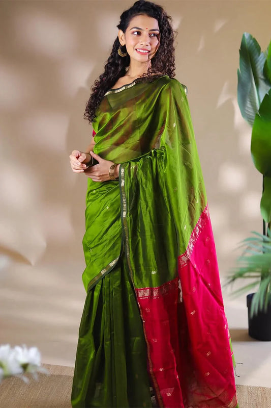Opulent Green Cotton Silk Saree With Demanding Blouse Piece