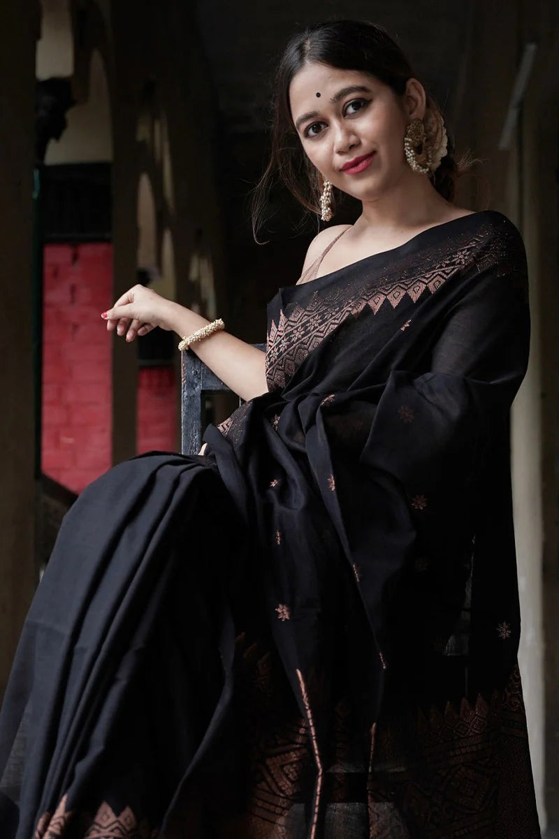 Entrancing Black Soft Silk Saree With Brood Blouse Piece
