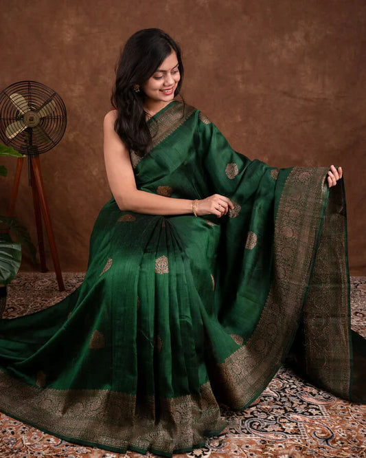 Surpassing Dark Green Soft Silk Saree With Dazzling Blouse Piece