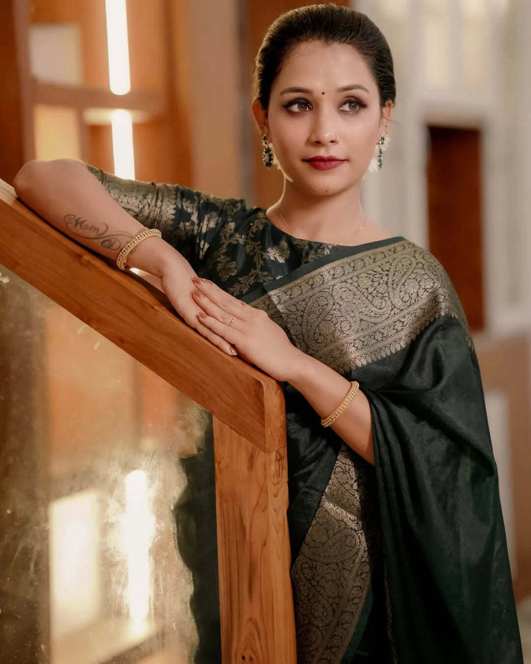 Luxuriant Dark Green Soft Silk Saree With Allure Blouse Piece