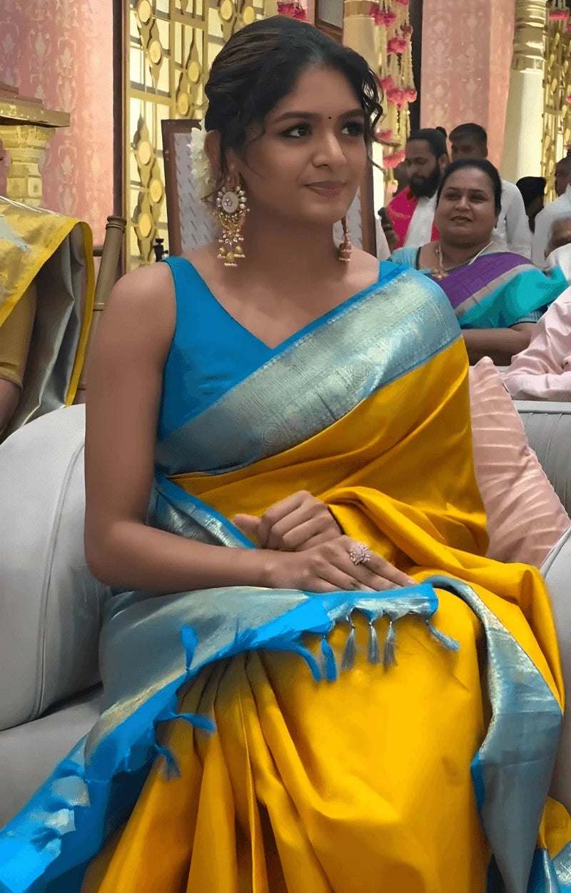 Flameboyant Yellow Soft Silk Saree With Eclat Blouse Piece