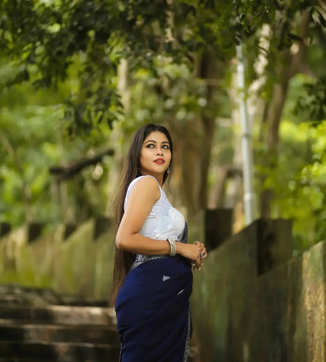Charming Navy Blue Soft Banarasi Silk Saree With Glowing Blouse Piece